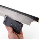 Illustration for article titled Motorola RAZR Teardown: Skinny Phone, Meet Big Saw